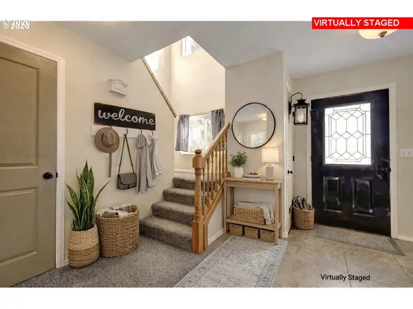 a living room with furniture and a clock