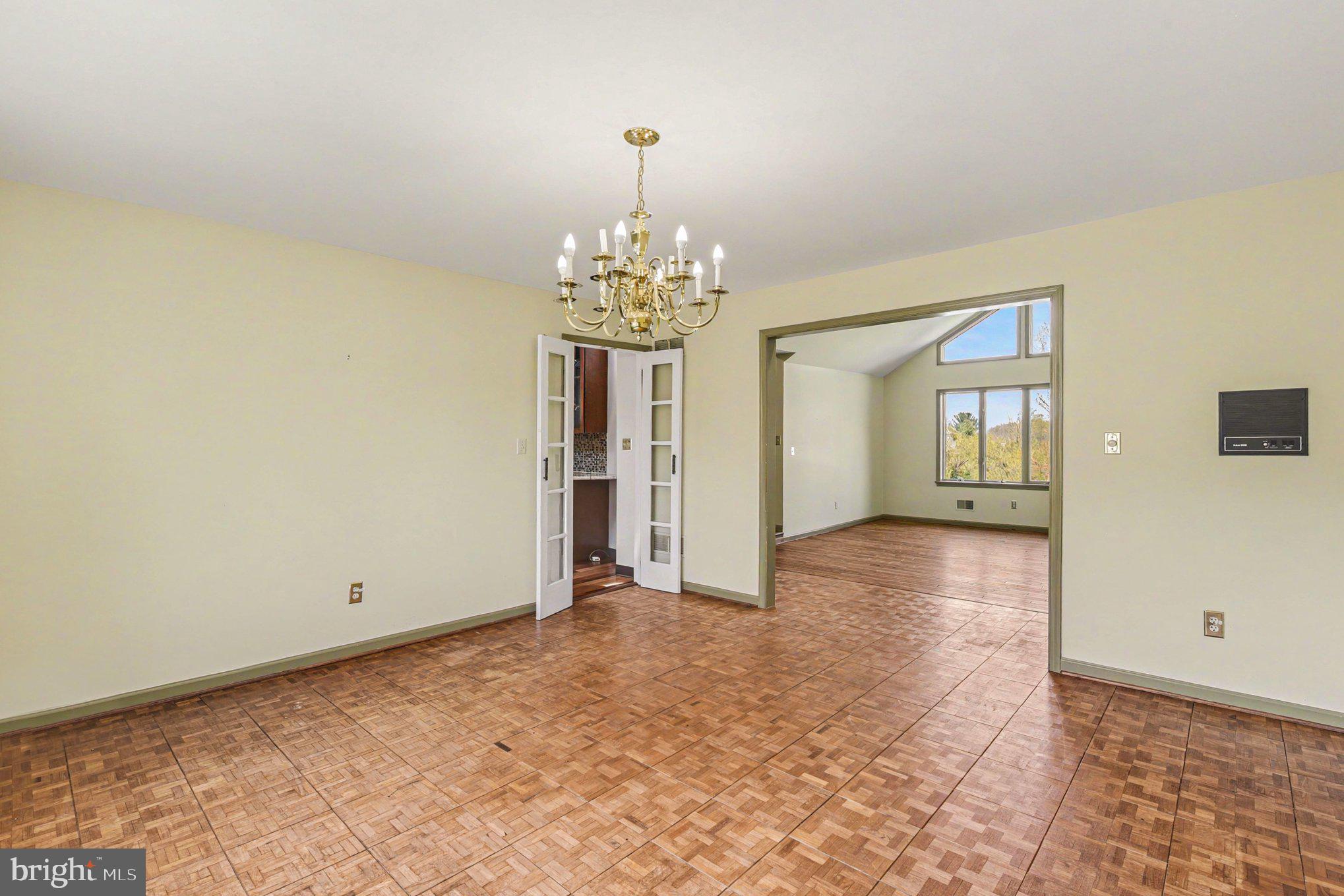 13800 Cripplegate Road Phoenix, MD 21131 - Photo 12 of 47 wooden floor in an empty room with a window