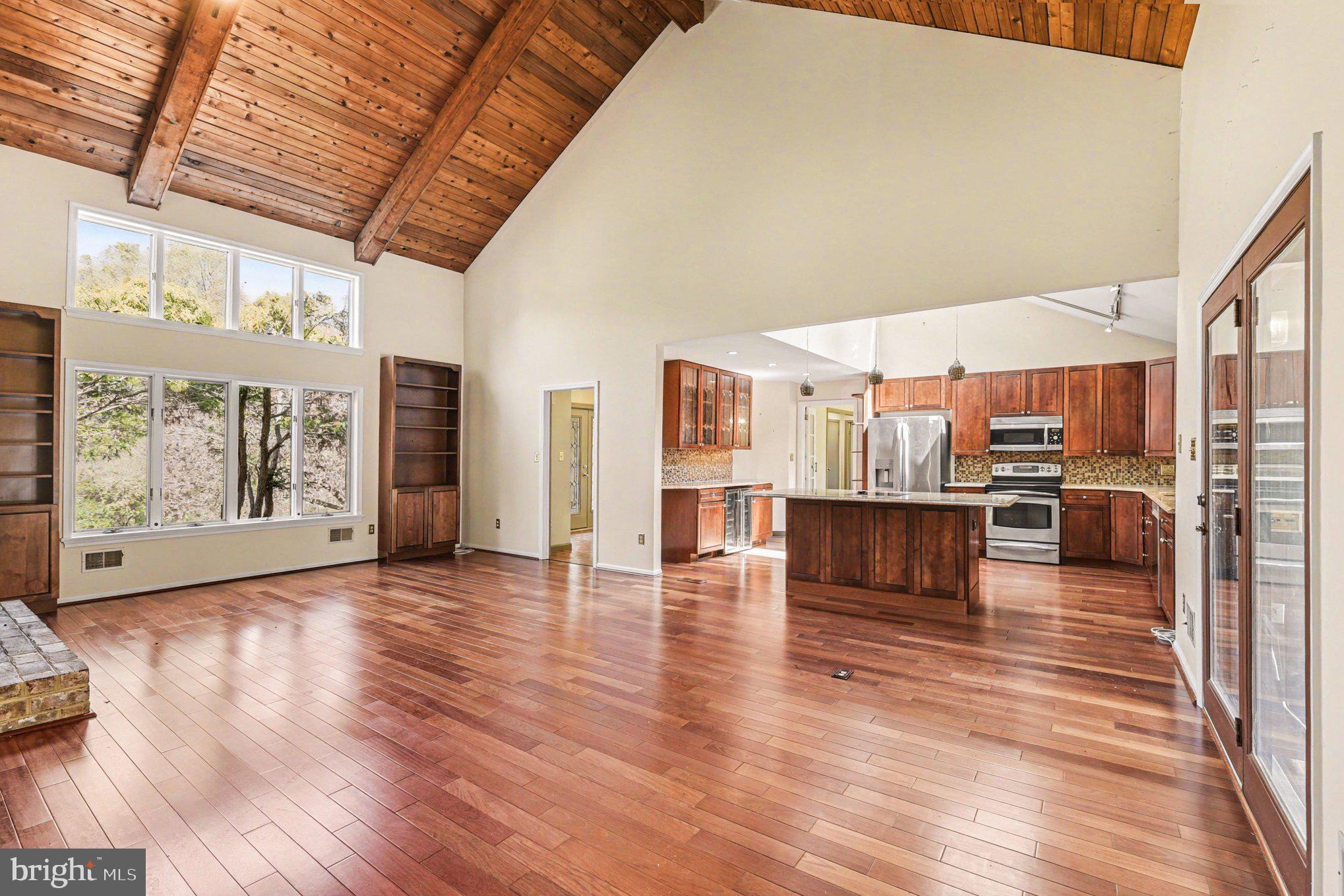 13800 Cripplegate Road Phoenix, MD 21131 - Photo 13 of 47 a view of a living room with furniture and wooden floor
