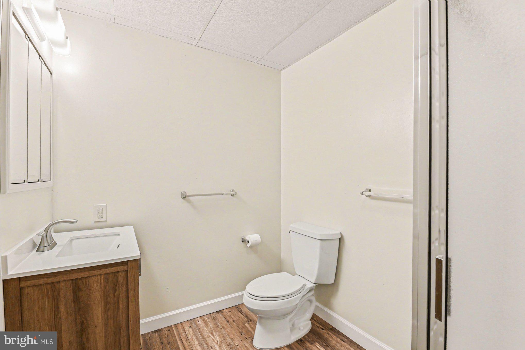13800 Cripplegate Road Phoenix, MD 21131 - Photo 27 of 47 a bathroom with a toilet and a sink