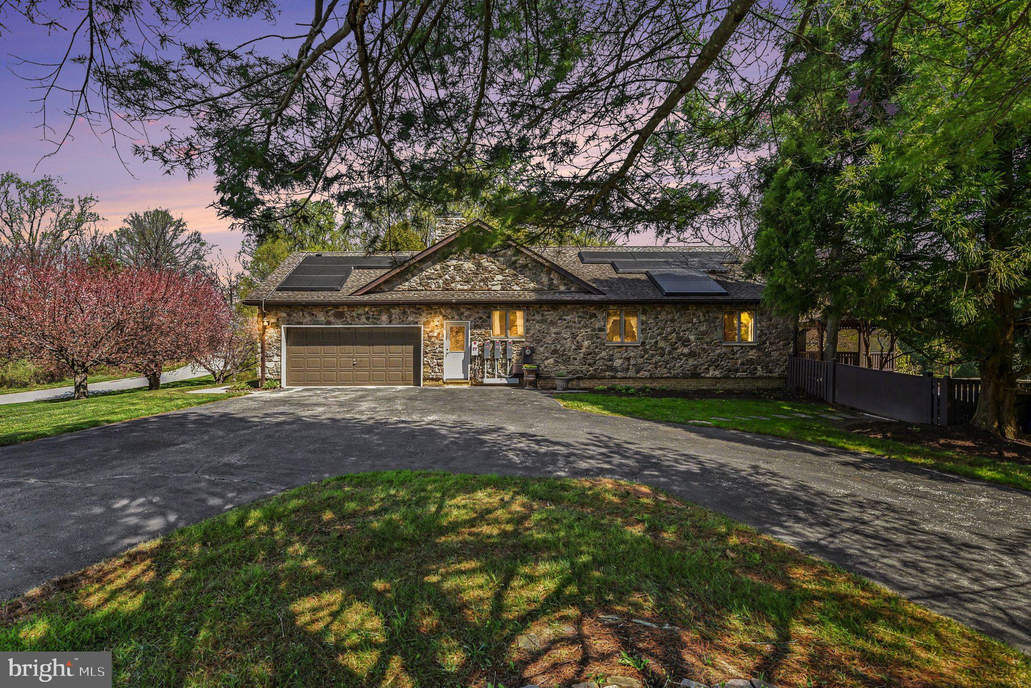 13800 Cripplegate Road Phoenix, MD 21131 - Photo 45 of 47 a front view of a house with garden