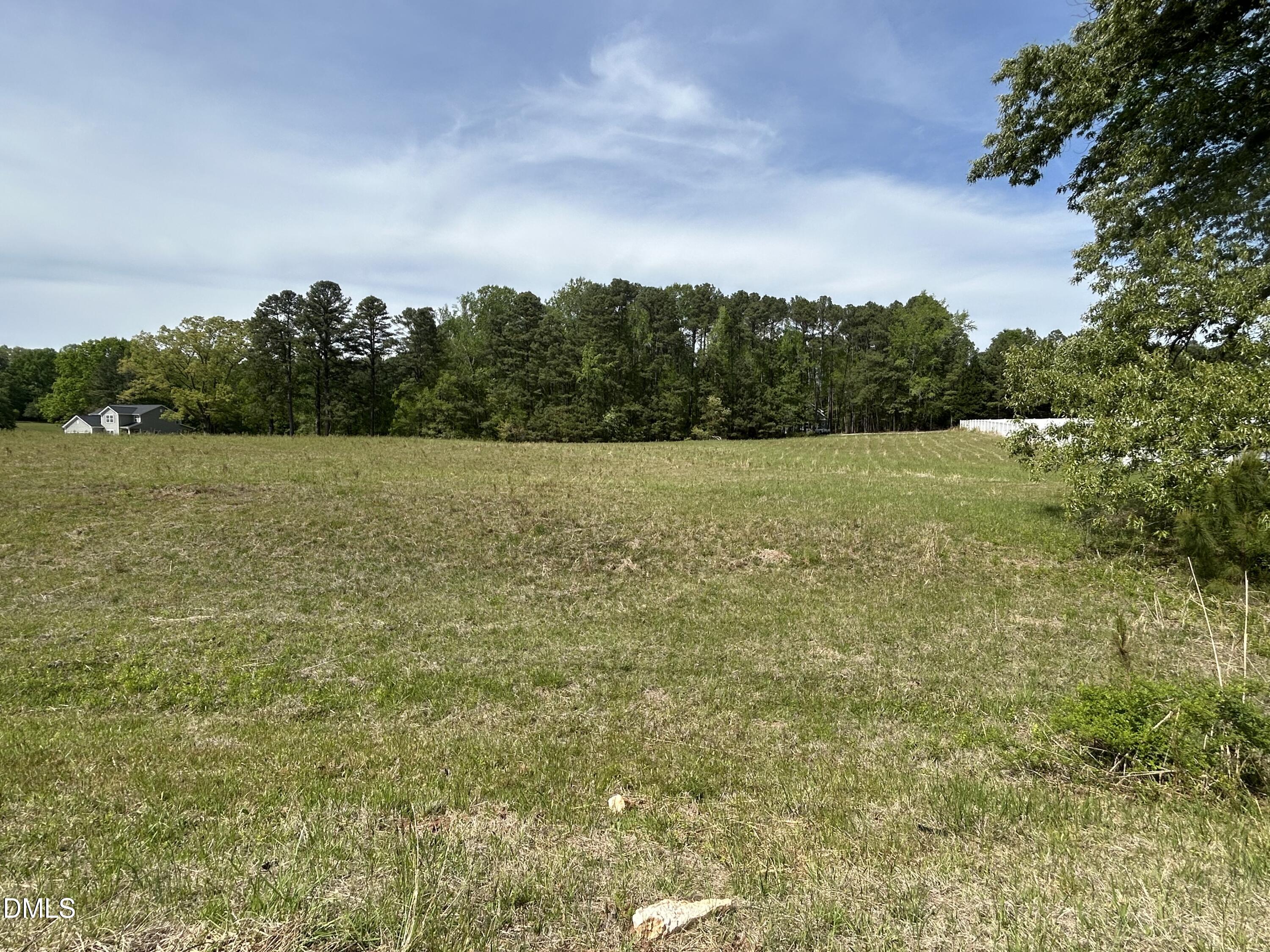 4612 Durham Road Wake Forest, NC 27587 - Photo 3 of 4 a view of an ocean from a yard