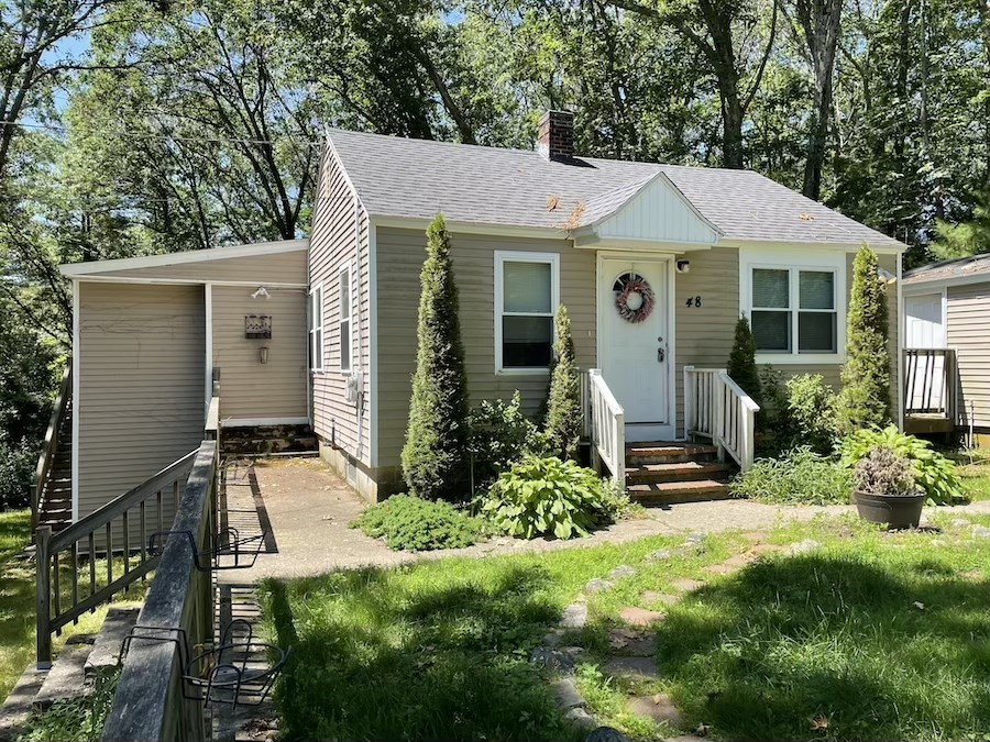 48 County Road Andover, MA 01810 - Photo 1 of 15 a front view of a house with a yard
