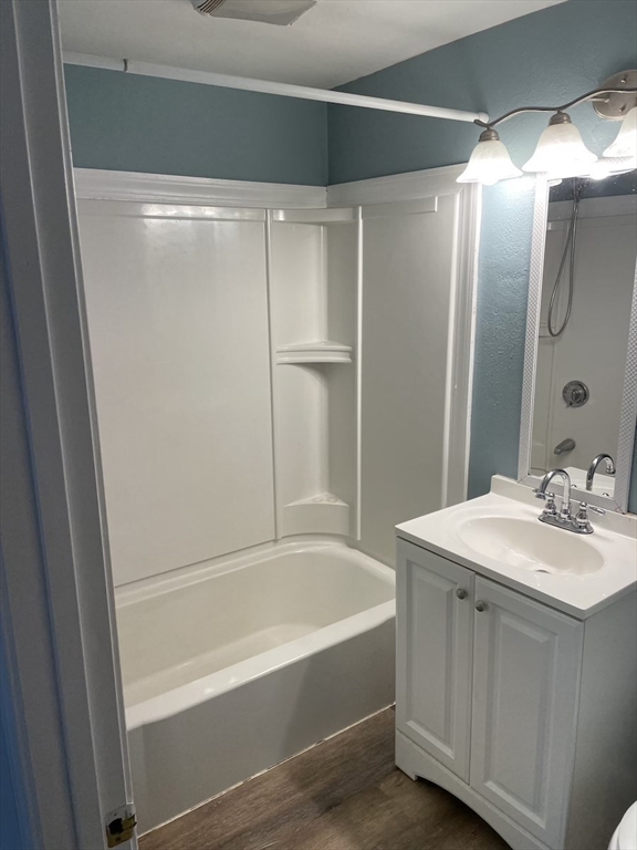 48 County Road Andover, MA 01810 - Photo 11 of 15 a bathroom with a bathtub and a sink