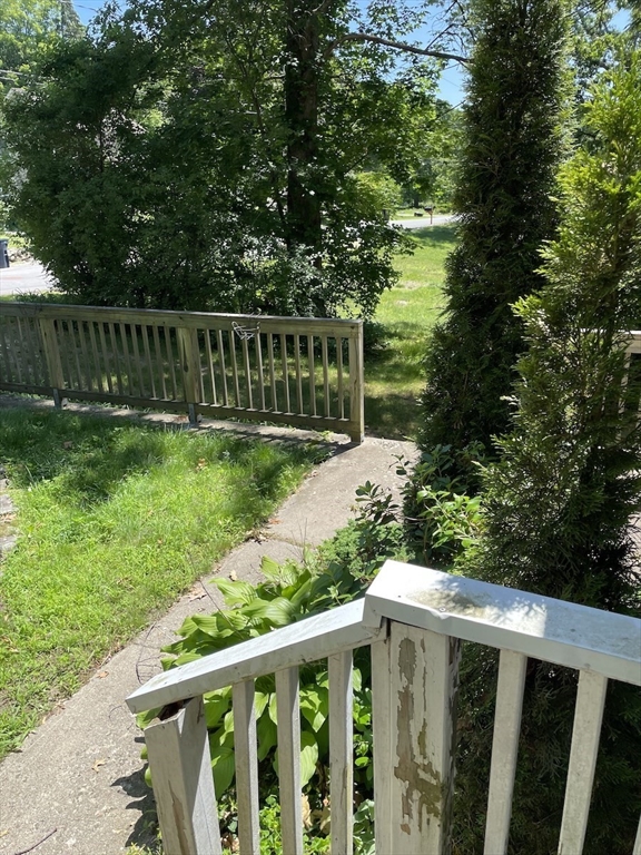 48 County Road Andover, MA 01810 - Photo 5 of 15 a view of a wooden deck and yard