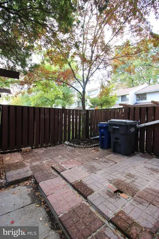 a bathroom with a sink and cabinets