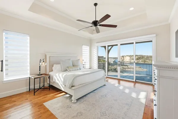 a bed room with a bed and a window