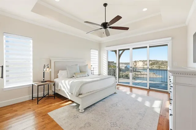 a bed room with a bed and a window