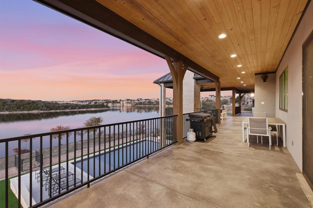 7105 West Hells Gate Drive Strawn, TX 76475 - Photo 32 of 39 a view of a terrace with furniture