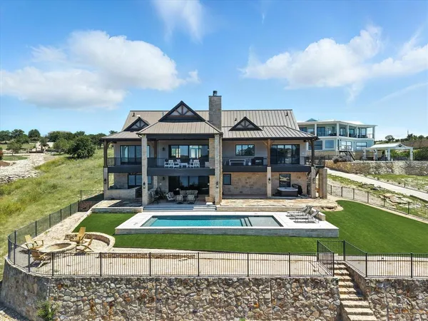 a view of a chairs and table in the terrace