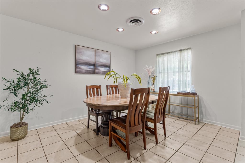 2612 Glendale Drive Waco, TX 76708 - Photo 11 of 38 Dining area featuring light tile patterned floors and recessed lighting