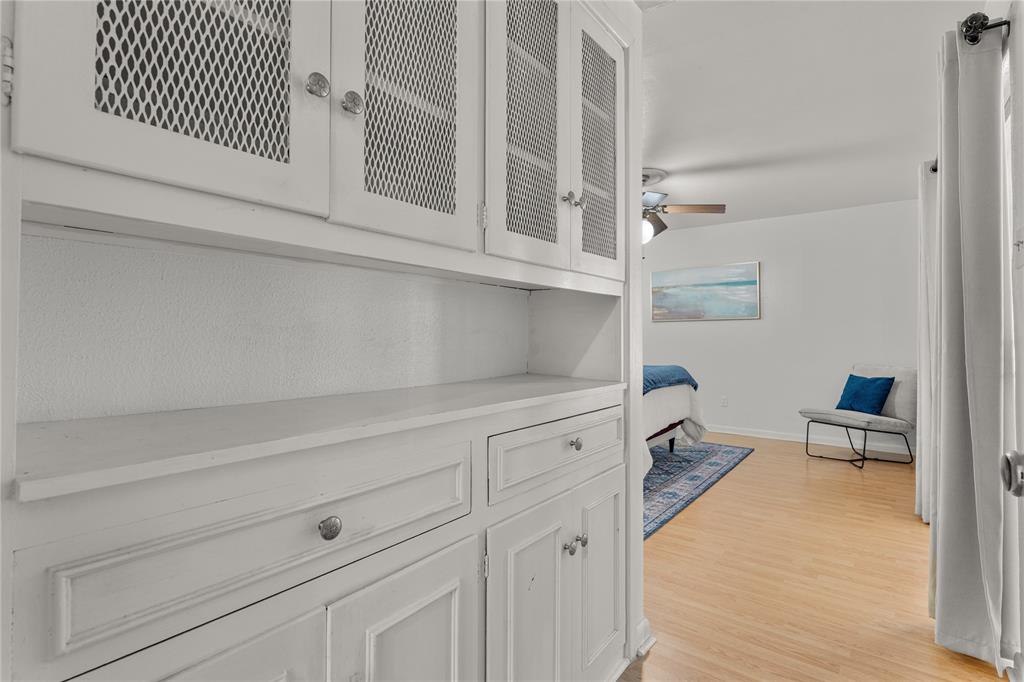 2612 Glendale Drive Waco, TX 76708 - Photo 13 of 38 Hallway featuring light wood-style flooring and baseboards