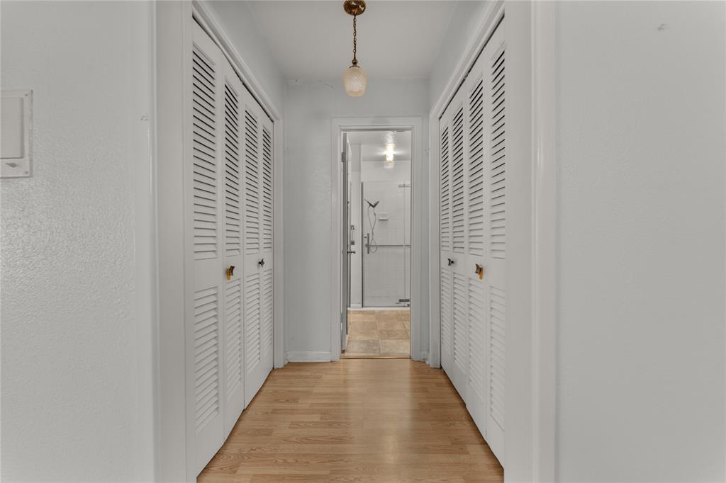 2612 Glendale Drive Waco, TX 76708 - Photo 15 of 38 Hallway featuring light wood-style flooring and baseboards
