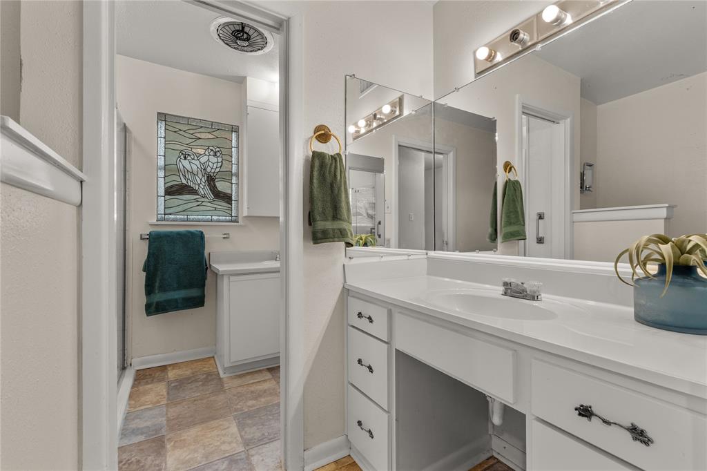 2612 Glendale Drive Waco, TX 76708 - Photo 17 of 38 Bathroom featuring vanity and light stone finish floors