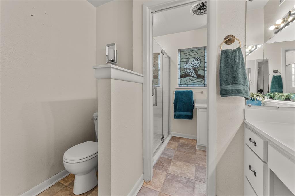 2612 Glendale Drive Waco, TX 76708 - Photo 18 of 38 Bathroom featuring vanity and a stall shower