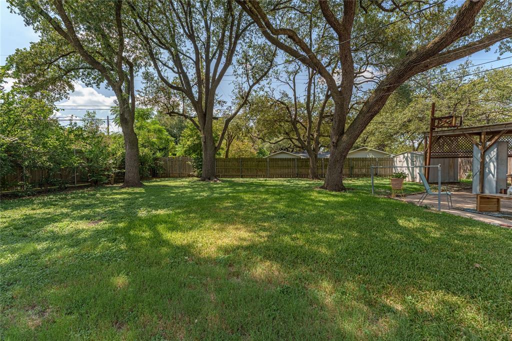 2612 Glendale Drive Waco, TX 76708 - Photo 26 of 38 Fenced backyard with a patio and a storage shed