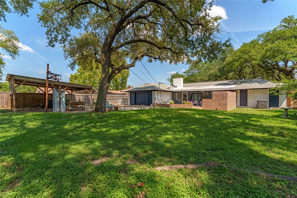 2612 Glendale Drive Waco, TX 76708 - Photo 28 of 38 View of yard with a patio and an outdoor structure