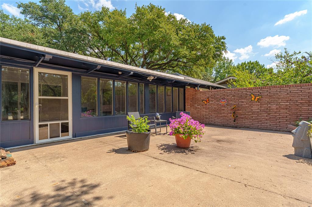 2612 Glendale Drive Waco, TX 76708 - Photo 31 of 38 View of patio with a sunroom