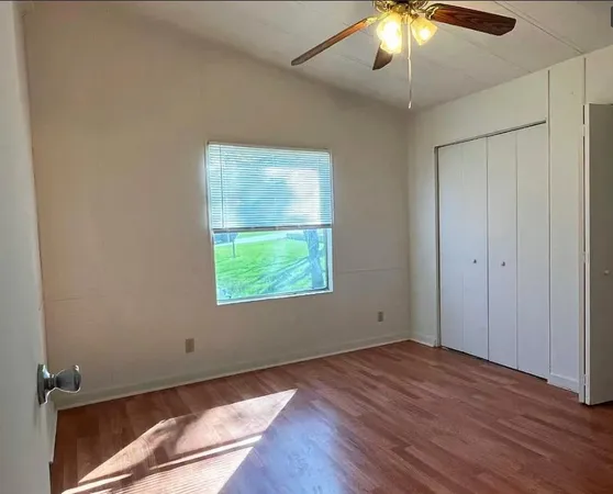 a view of kitchen and kitchen with furniture wooden floor and window