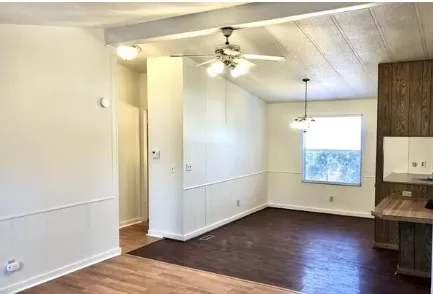 a view of an empty room and window