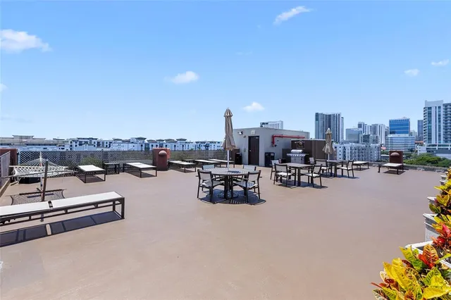 a view of a terrace with chairs