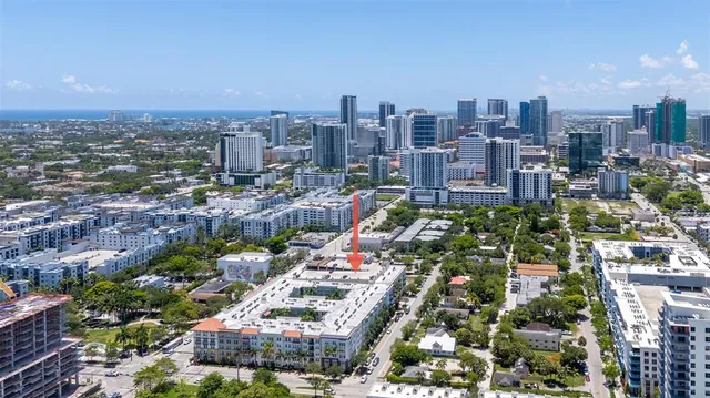 a view of a city with tall buildings