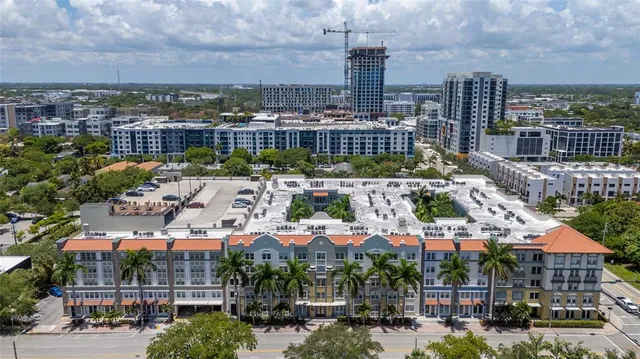 a view of a city with tall buildings