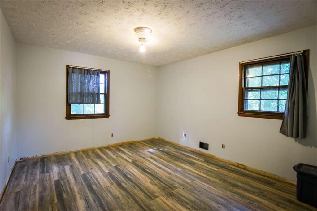17 Valley Trail Covington, GA 30014 - Photo 10 of 19 a view of empty room with windows