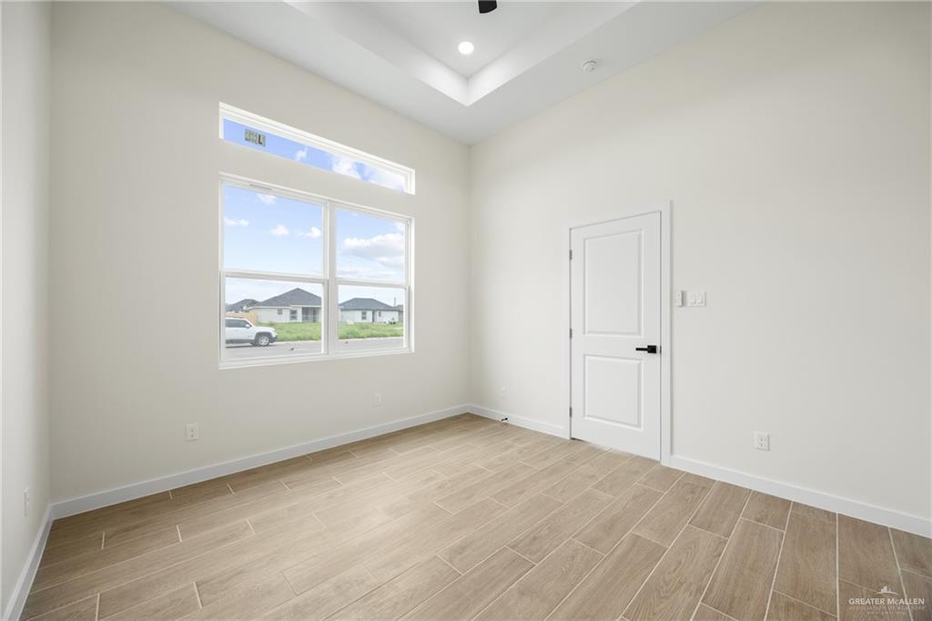 3610 Satelite Street Edinburg, TX 78542 - Photo 14 of 22 an empty room with windows and closet