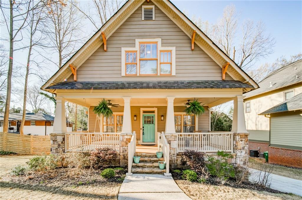 1963 Timberwood Trace Decatur, GA 30032 - Photo 1 of 1 a front view of a house with a yard