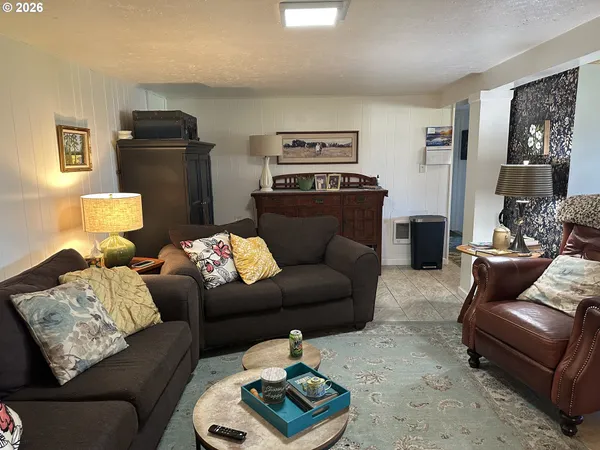 a living room with furniture and a couch