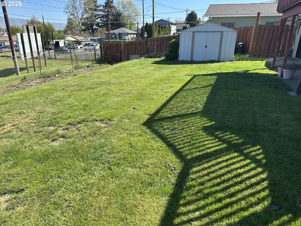 a view of an outdoor space and a yard