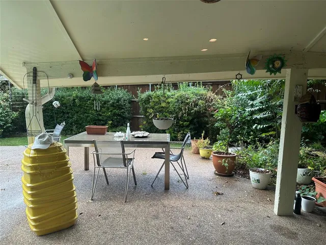 a view of swimming pool from a balcony