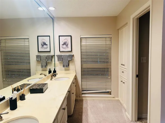 a bathroom with a shower and a bathtub