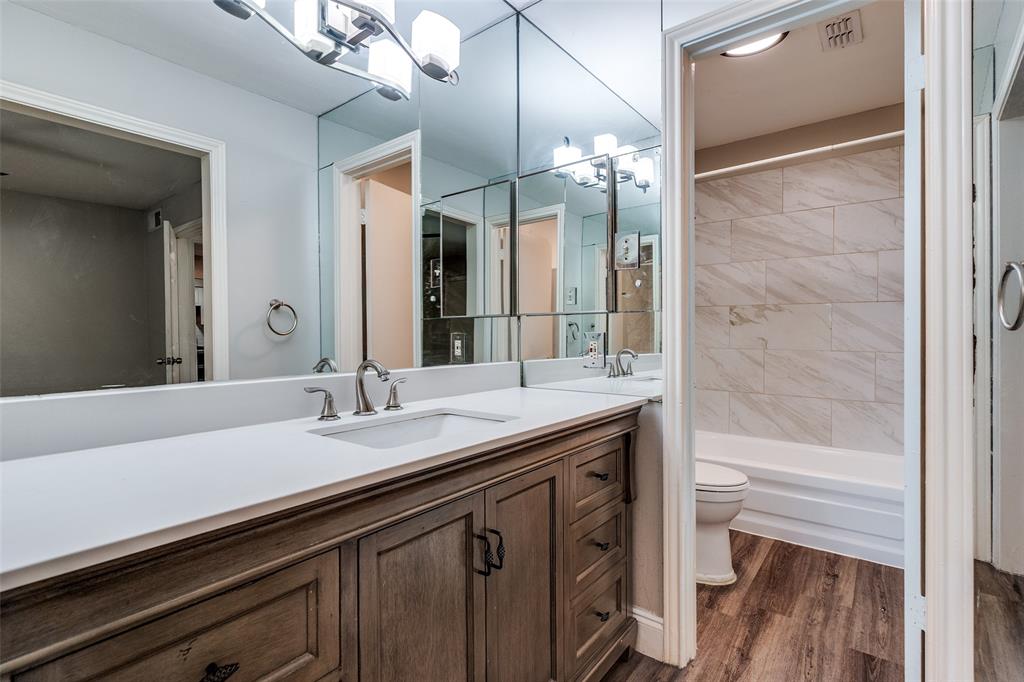 5840 Spring Valley Road, Unit 803 Dallas, TX 75254 - Photo 7 of 12 Updated Primary en-suite bathroom.