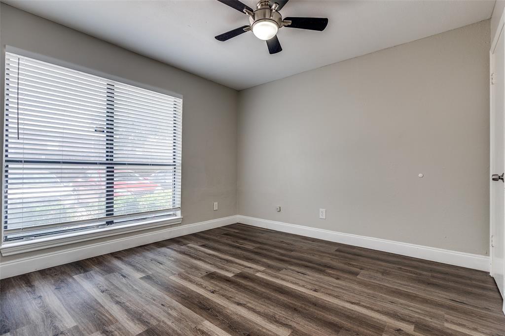 5840 Spring Valley Road, Unit 803 Dallas, TX 75254 - Photo 8 of 12 Secondary bedroom with walk-in closet and ceiling fan can also be used as an office.