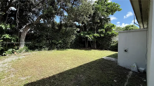 a view of outdoor space with yard
