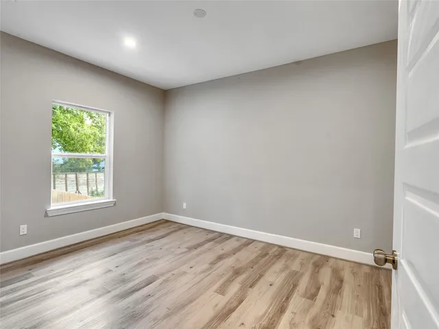 wooden floor and closet in a room