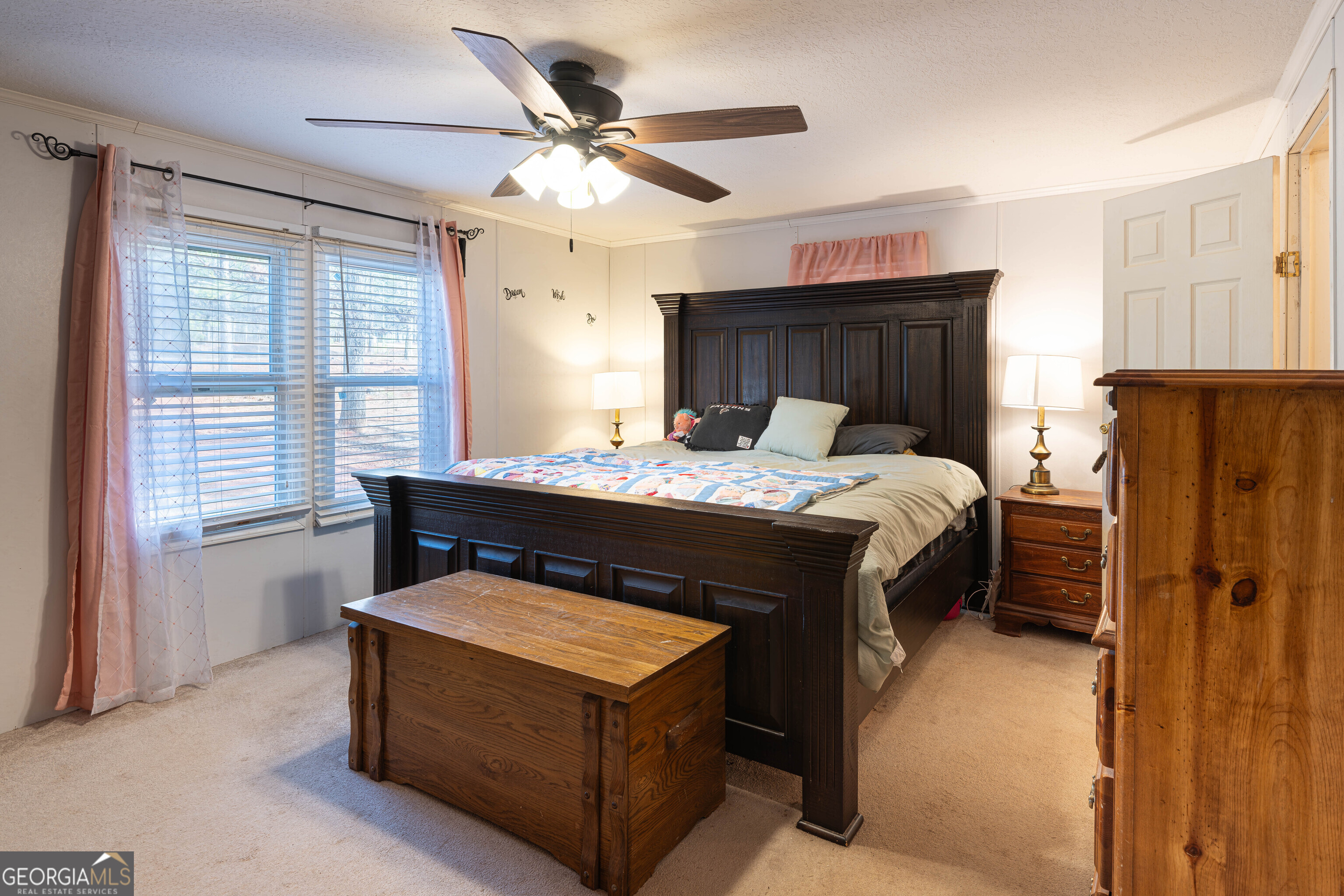 161 Cherokee Trail Forsyth, GA 31029 - Photo 13 of 32 a bedroom with a bed and a window