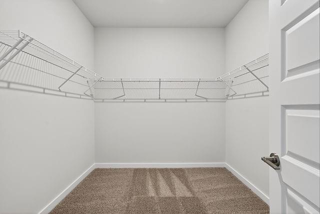 2562 Harbor Ridge Pass Gainesville, GA 30507 - Photo 24 of 27 a view of a room with racks on the wall