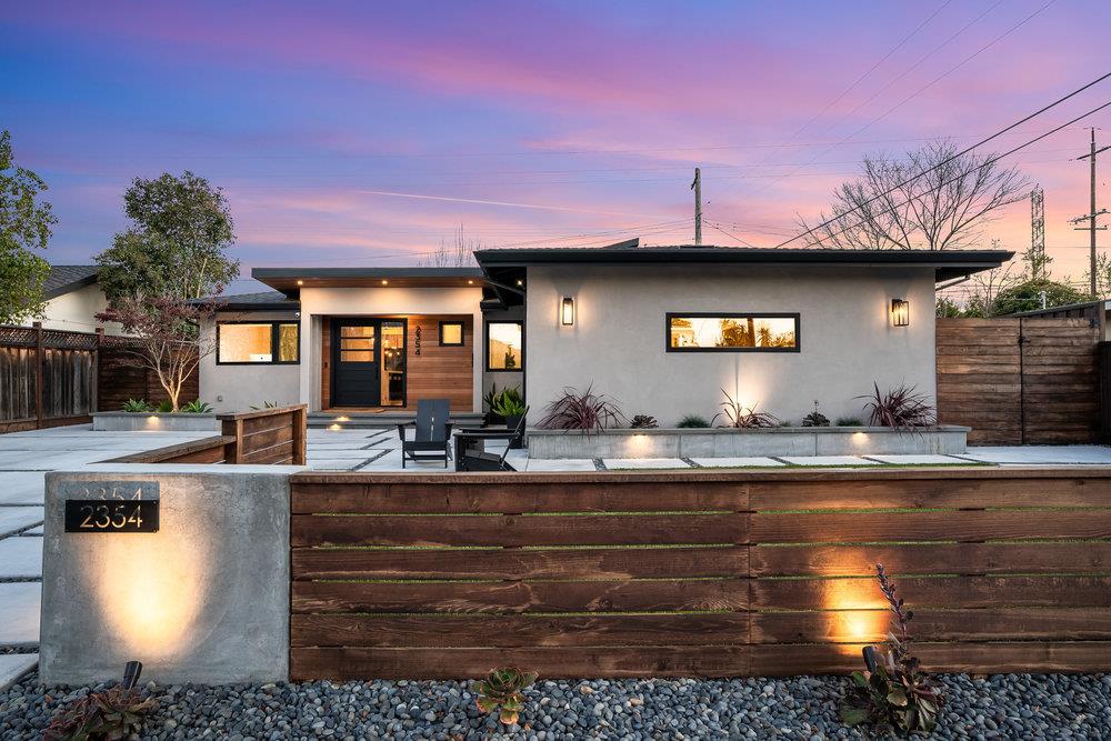 a front view of a house with swimming pool