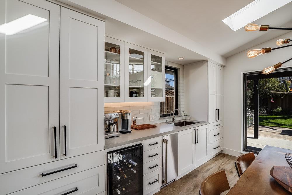 2354 Marr Lane San Jose, CA 95124 - Photo 31 of 55 a kitchen with stainless steel appliances a sink stove and cabinets