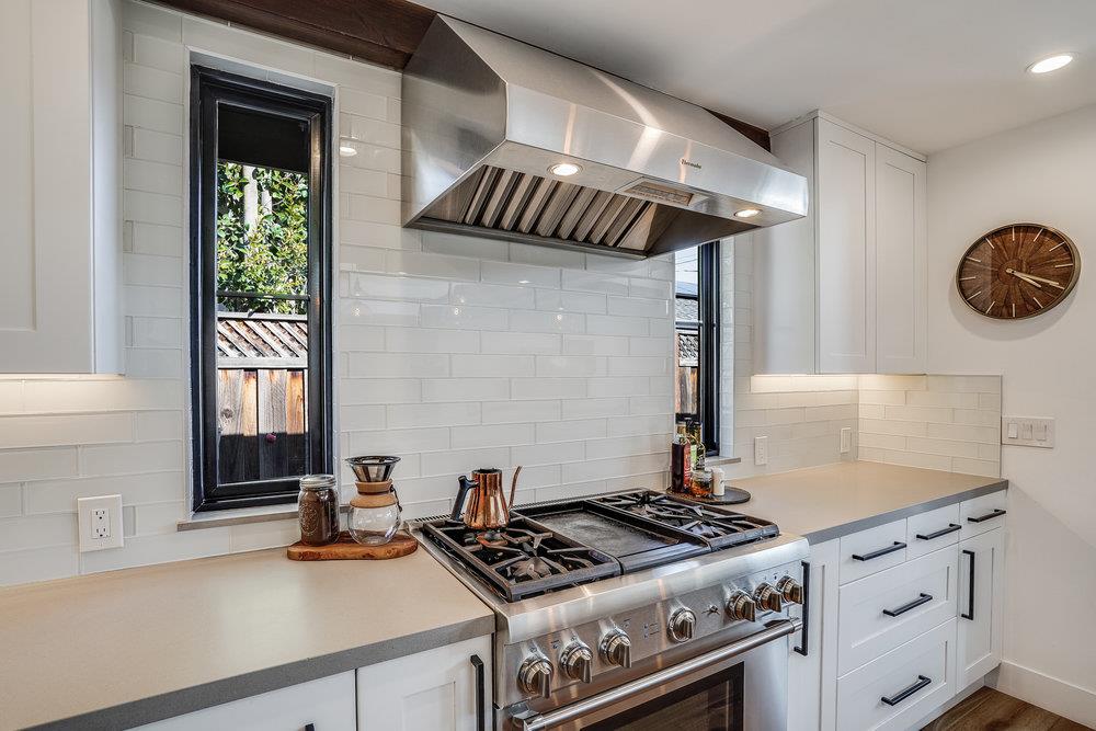 2354 Marr Lane San Jose, CA 95124 - Photo 38 of 55 a stove top oven sitting inside of a kitchen