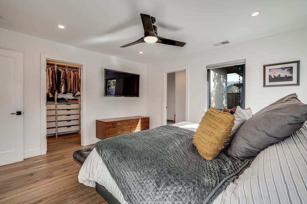 2354 Marr Lane San Jose, CA 95124 - Photo 41 of 55 a bedroom with a bed and a television