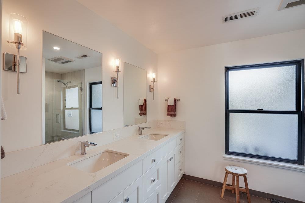 2354 Marr Lane San Jose, CA 95124 - Photo 43 of 55 a bathroom with a double vanity sink and mirror
