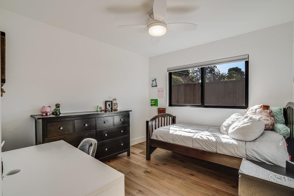 2354 Marr Lane San Jose, CA 95124 - Photo 48 of 55 a bedroom with a bed and wooden floor