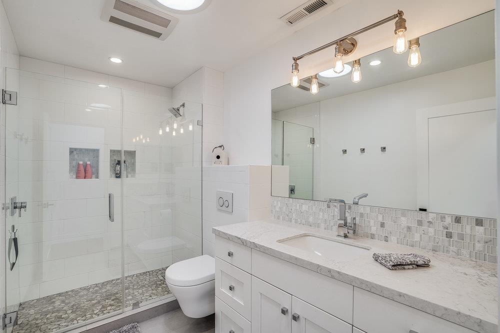 2354 Marr Lane San Jose, CA 95124 - Photo 49 of 55 a bathroom with a granite countertop sink toilet and shower