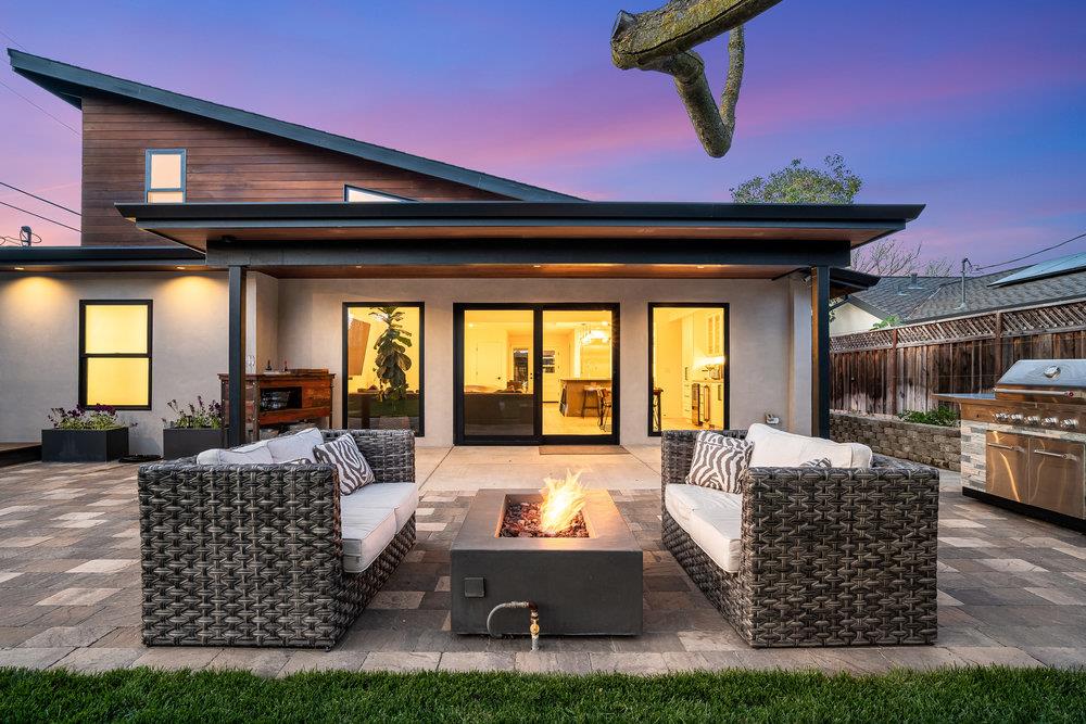 2354 Marr Lane San Jose, CA 95124 - Photo 8 of 55 a living room with furniture a rug and a chandelier