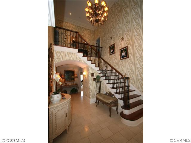 Foyer - Two -story entrance foyer with wallpaper,