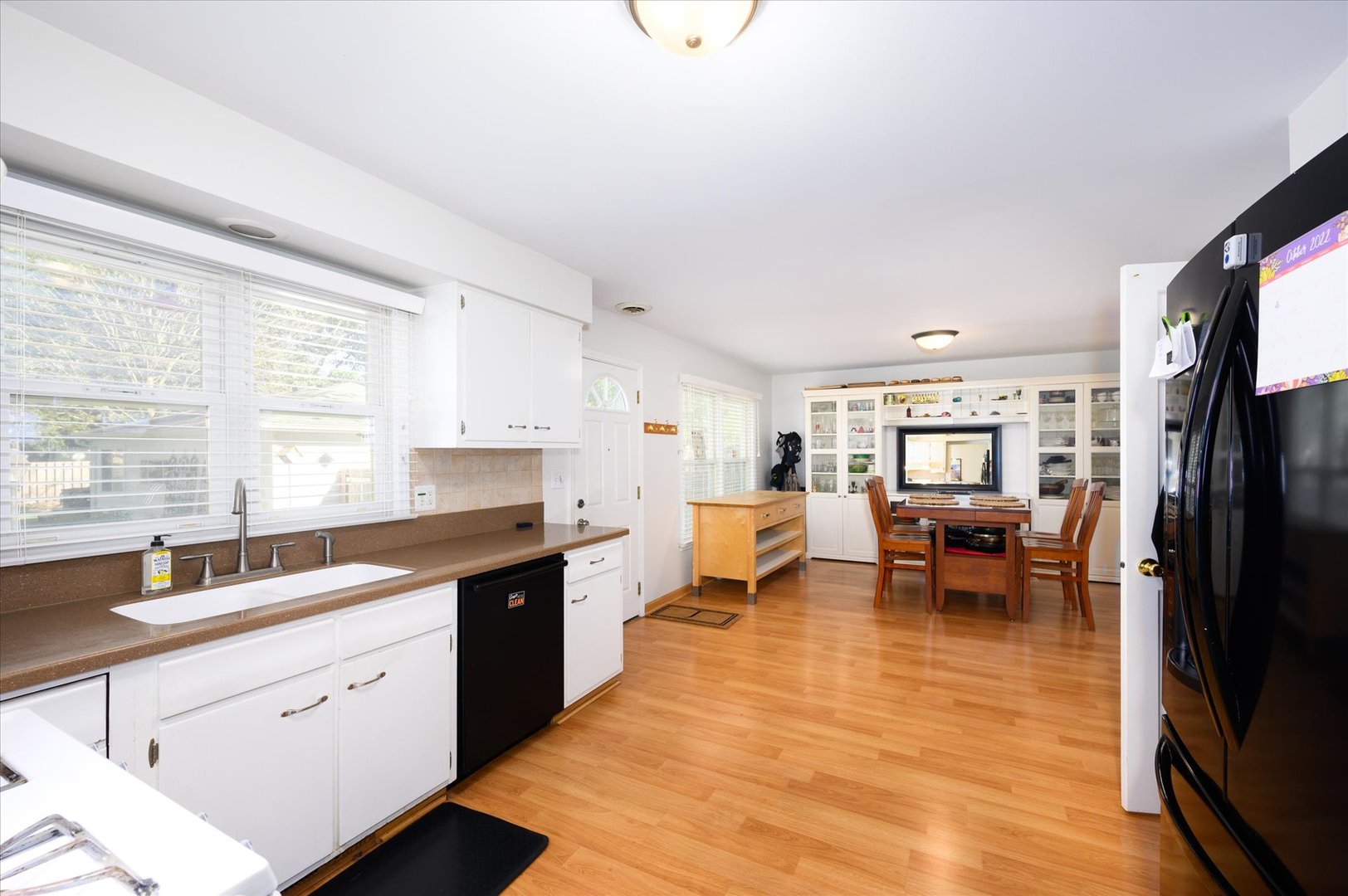 1709 Kay Road Wheaton, IL 60187 - Photo 12 of 37 a large white kitchen with stainless steel appliances